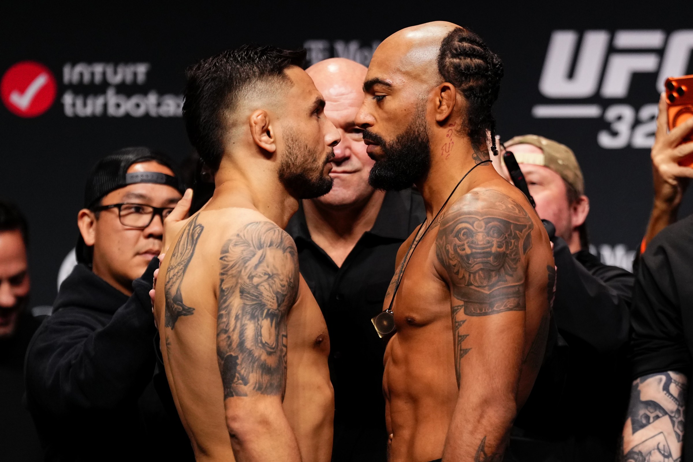 LAS VEGAS, NEVADA - JANUARY 23: (L-R) Alex Perez and Charles Johnson face off during the UFC 324 ceremonial weigh-in at T-Mobile Arena on January 23, 2026 in Las Vegas, Nevada. (Photo by Jeff Bottari/Zuffa LLC)