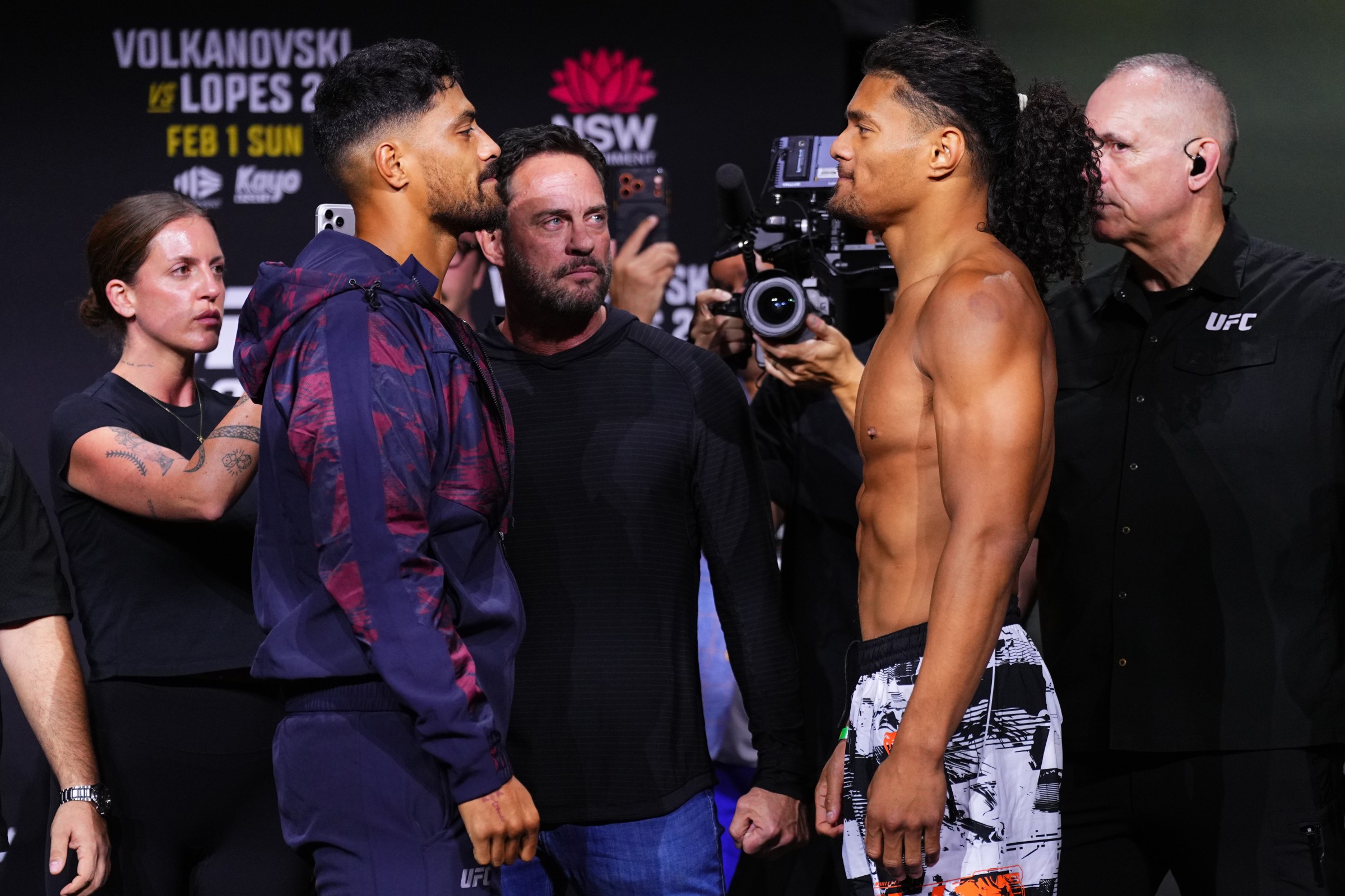 SYDNEY, AUSTRALIA - JANUARY 30: (L-R) Opponents Junior Tafa of Australia and Billy Elekana face off during the UFC 325 Ceremonial Weigh-in at Qudos Bank Arena on January 30, 2026 in Sydney, Australia. (Photo by Jeff Bottari/Zuffa LLC)