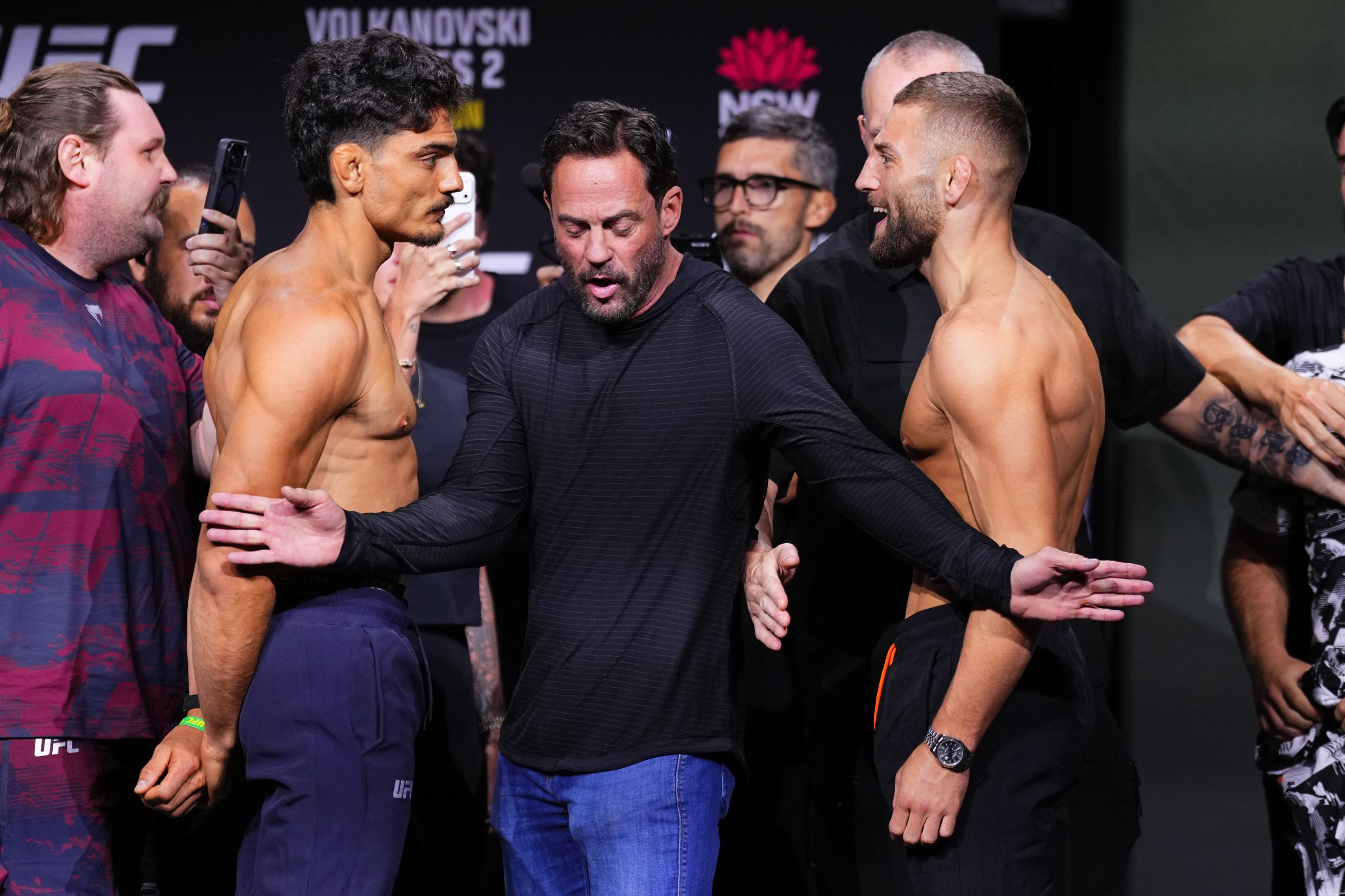 SYDNEY, AUSTRALIA - JANUARY 30: (L-R) Opponents Jonathan Micallef of Australia and Oban Elliott of Wales face off during the UFC 325 Ceremonial Weigh-in at Qudos Bank Arena on January 30, 2026 in Sydney, Australia. (Photo by Jeff Bottari/Zuffa LLC)