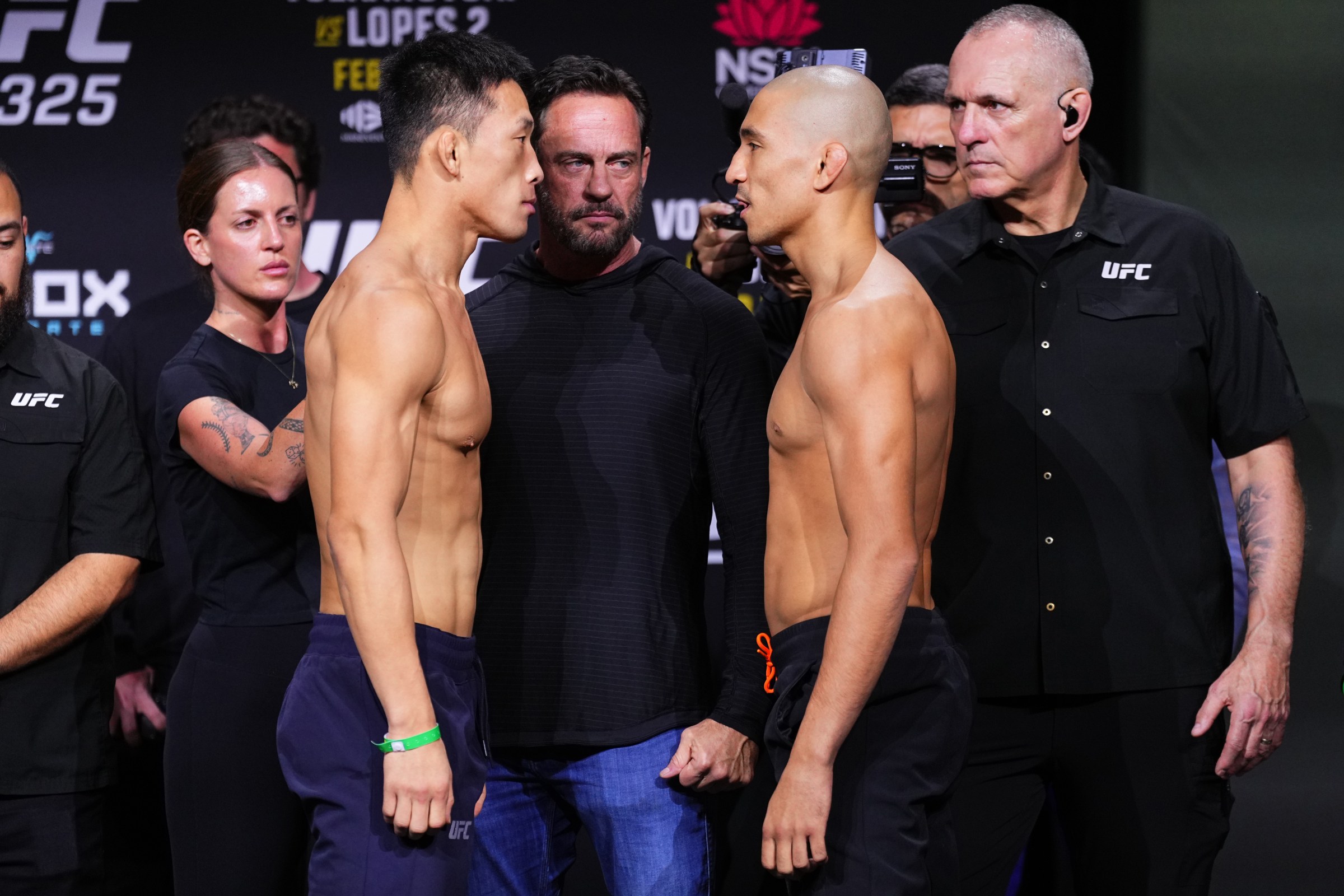 SYDNEY, AUSTRALIA - JANUARY 30: (L-R) Opponents Sangwook Kim of South Korea and Dom Mar Fan of Australia face off during the UFC 325 Ceremonial Weigh-in at Qudos Bank Arena on January 30, 2026 in Sydney, Australia. (Photo by Jeff Bottari/Zuffa LLC)