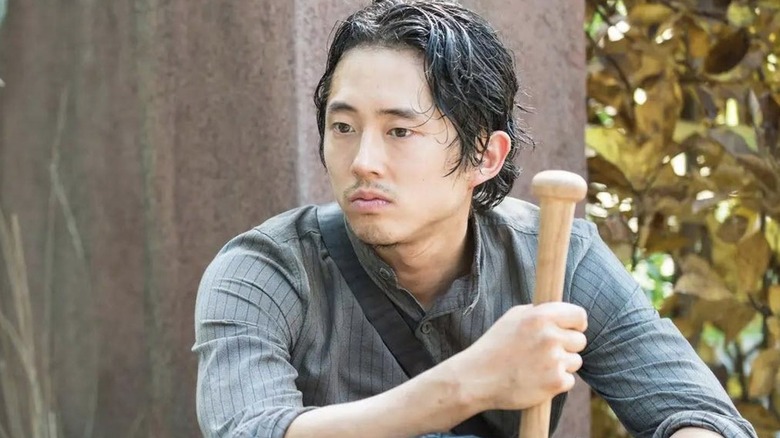 Glen holding a baseball bat in The Walking Dead