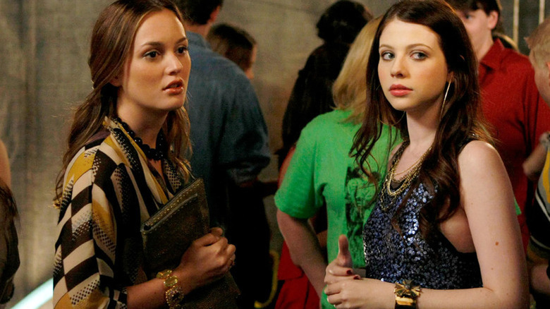 Blair Waldorf & Georgina Sparks eye something suspiciously in Gossip Girl