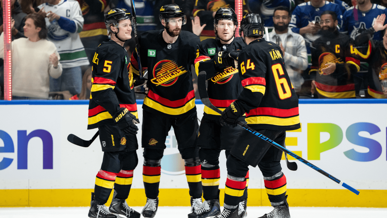 Canucks score 4 straight, hold off Capitals to end 11-game slide