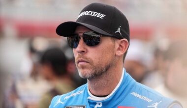 FILE - Denny Hamlin looks on prior to a NASCAR Cup Series auto race at Charlotte Motor Speedway, Sunday, Oct. 5, 2025, in Concord, N.C. (AP Photo/Matt Kelley, File)