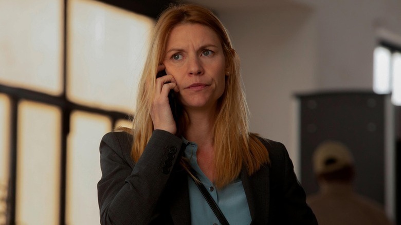 A disgruntled Carrie Mathison (Claire Danes) answers her cell phone in Homeland