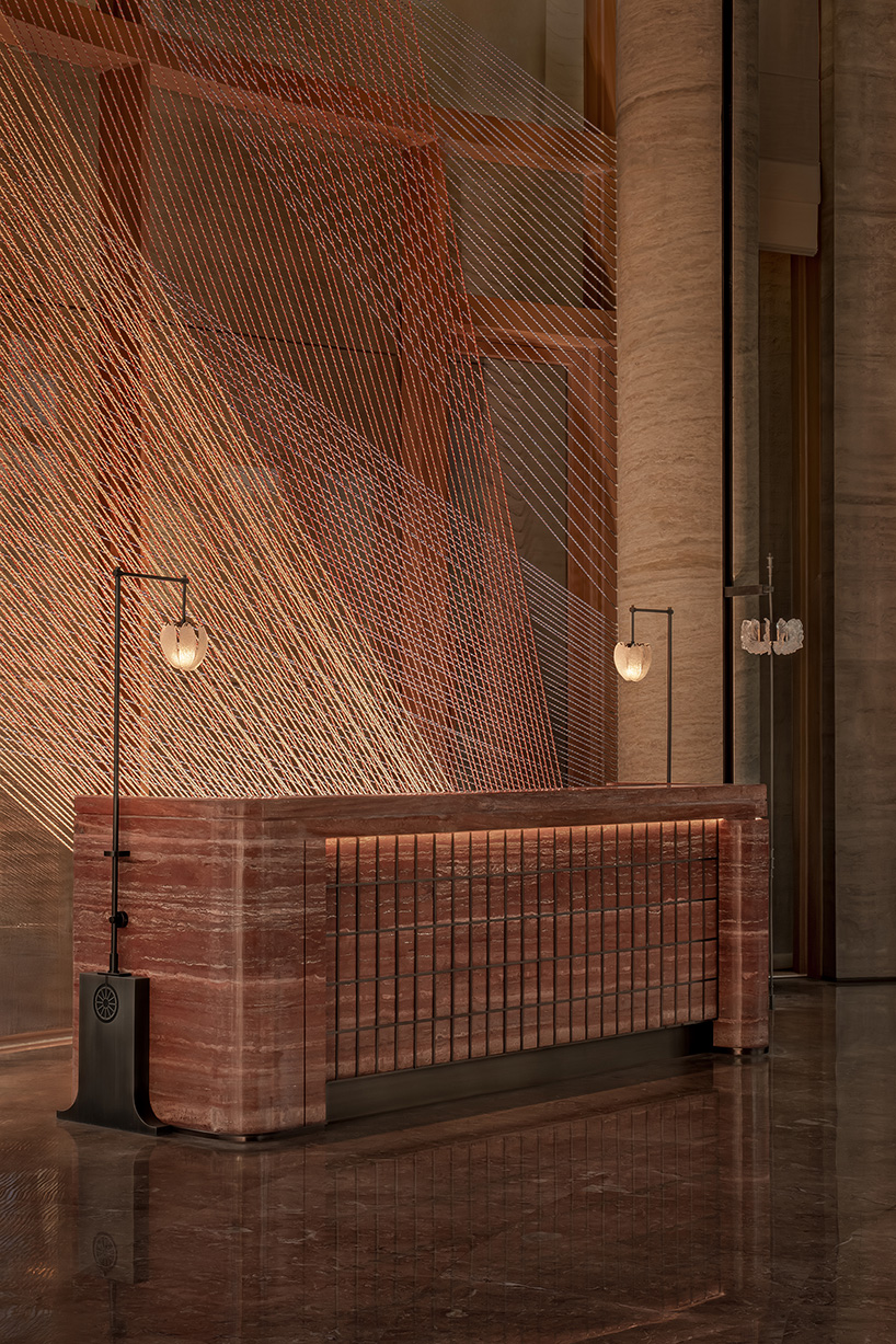 hotel by ccd reinterprets nomadic cultural patterns through dispersed brick volumes in china