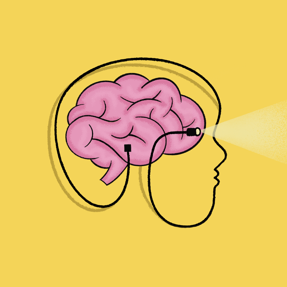 Illustration of a brain as a headlamp shining light from a person's head profile on yellow.