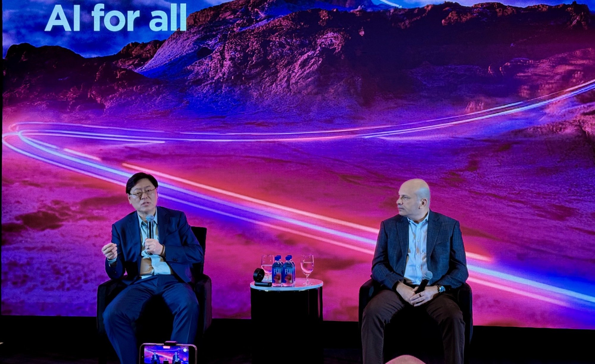 Lenovo CEO Yang Yuanqing and Chief Technology Officer Tolga Kurtoglu speak to the media at CES 2026.