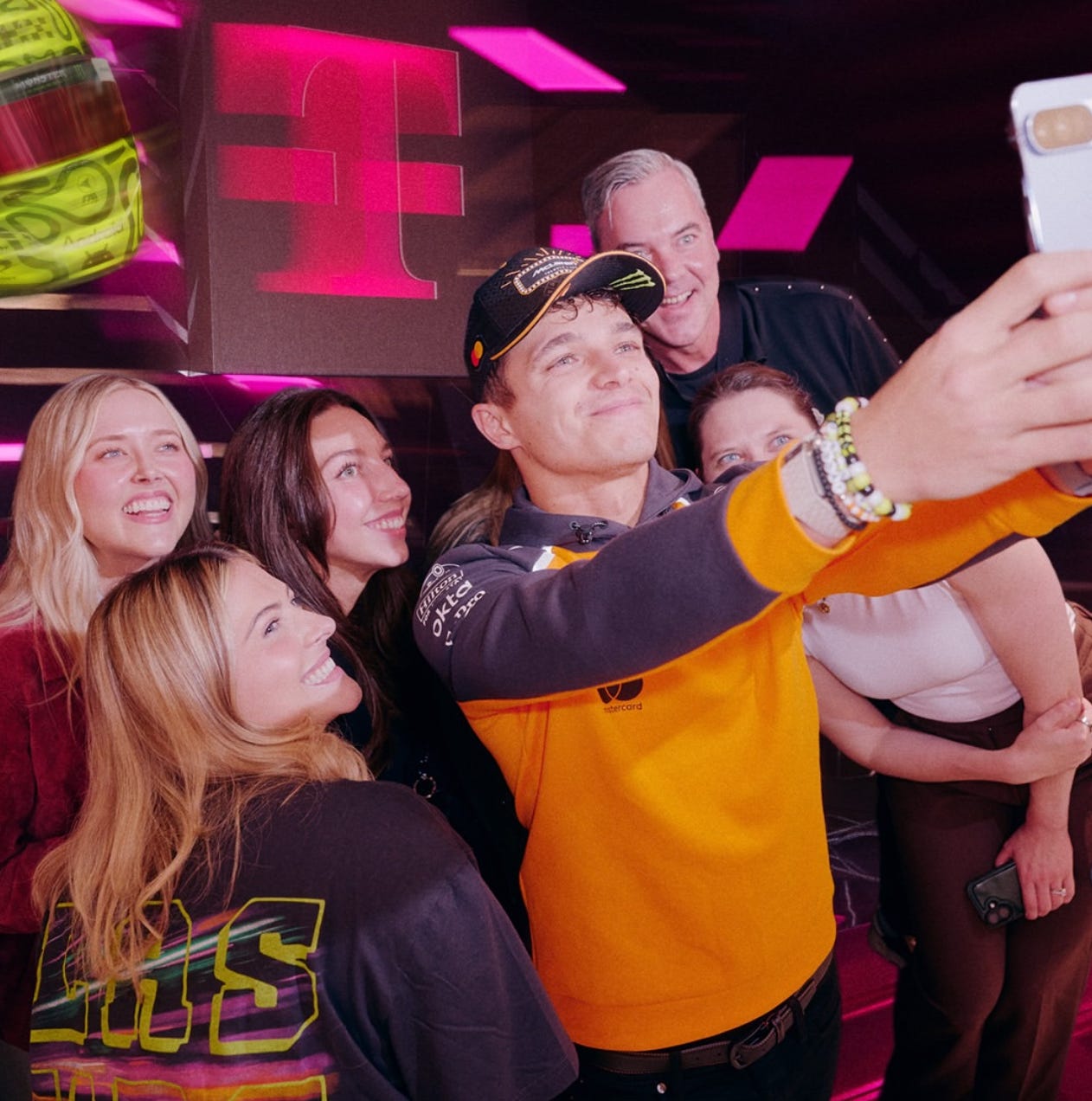 group of individuals taking a selfie together at an event