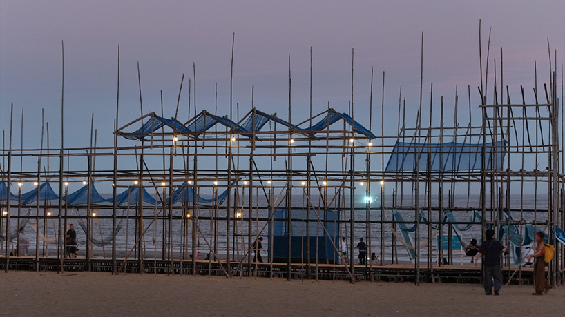 traditional bamboo scaffolding constructs temporary theater along chinese coast