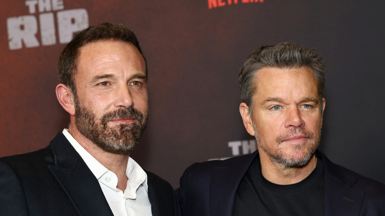 Ben Affleck and Matt Damon posing for a photograph
