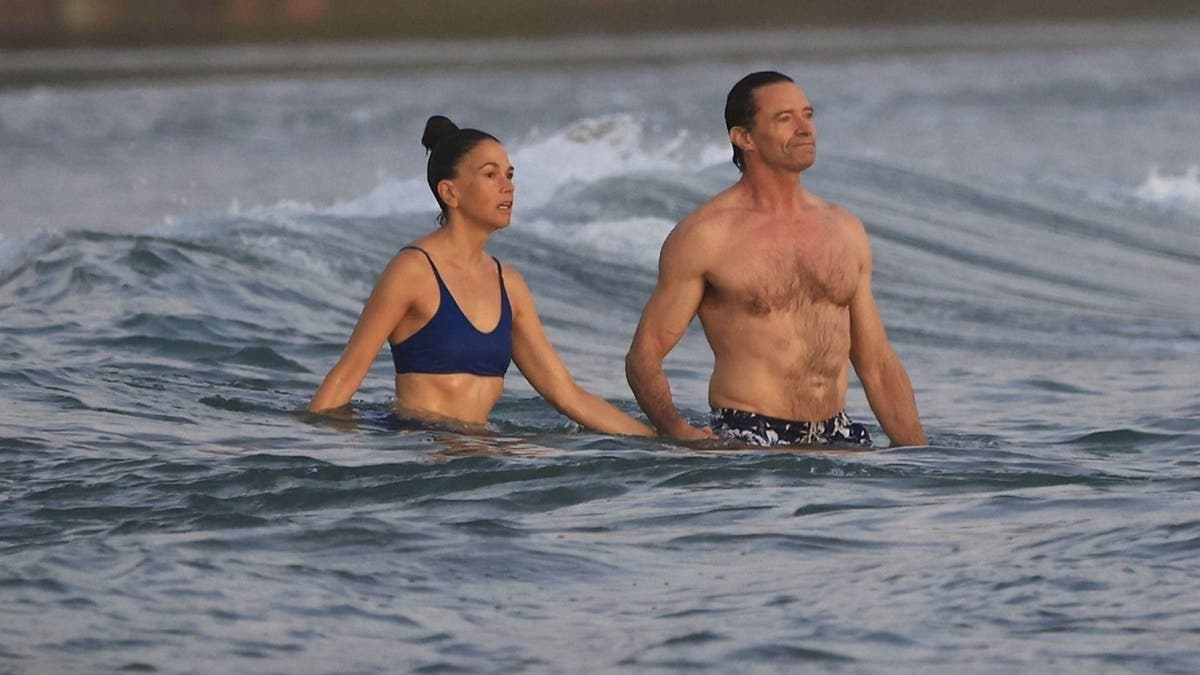 Sutton Foster and Hugh Jackman in the water