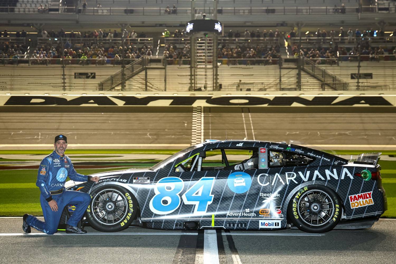 Jimmie Johnson, driver of the #84 Carvana Toyota poses on track qualifying for the NASCAR Cup Series Daytona 500 at Daytona International Speedway on February 12, 2025 in Daytona Beach, Florida. (Photo by Jared C. Tilton/Getty Images for NASCAR)