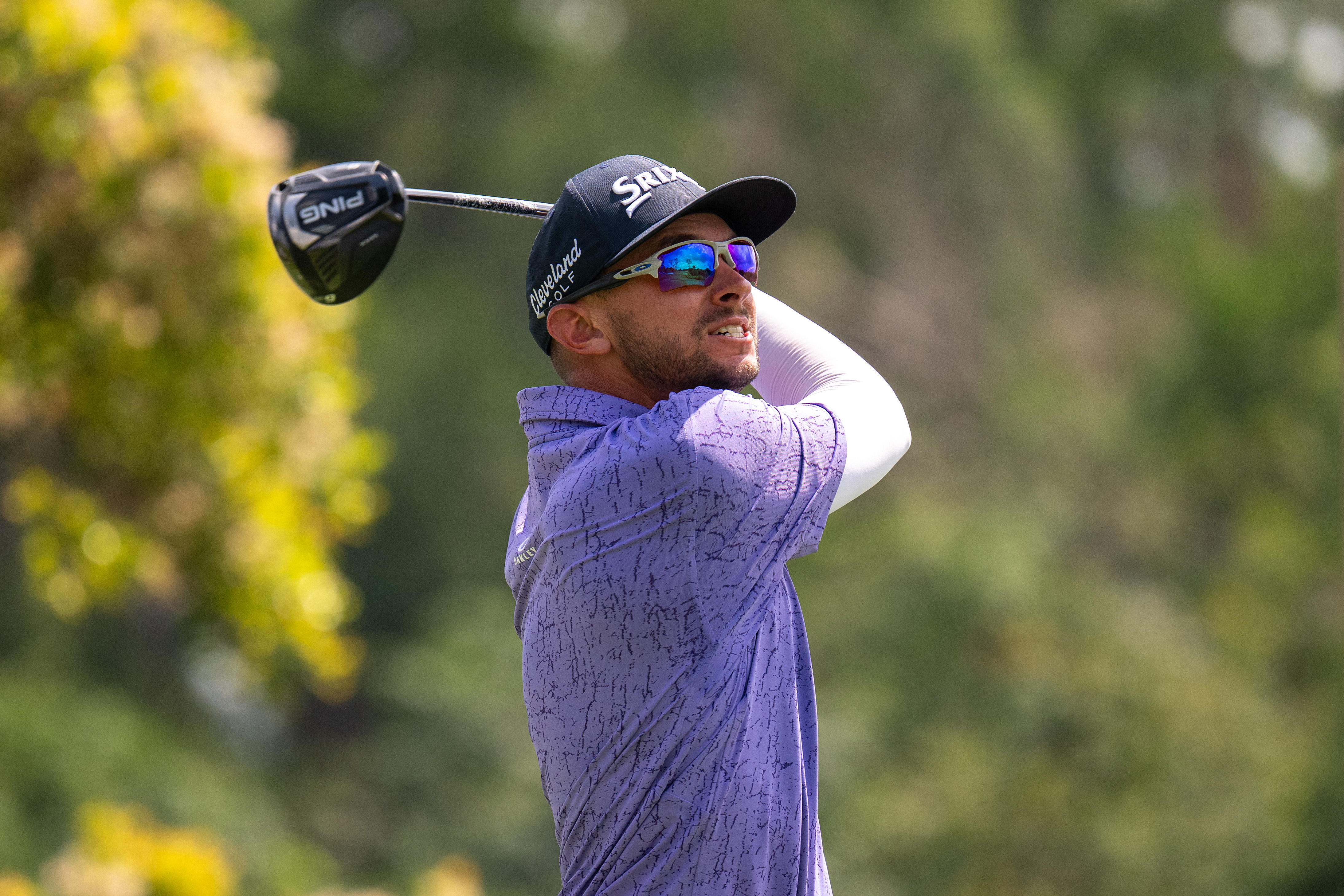 John Catlin hits a driver off the tee