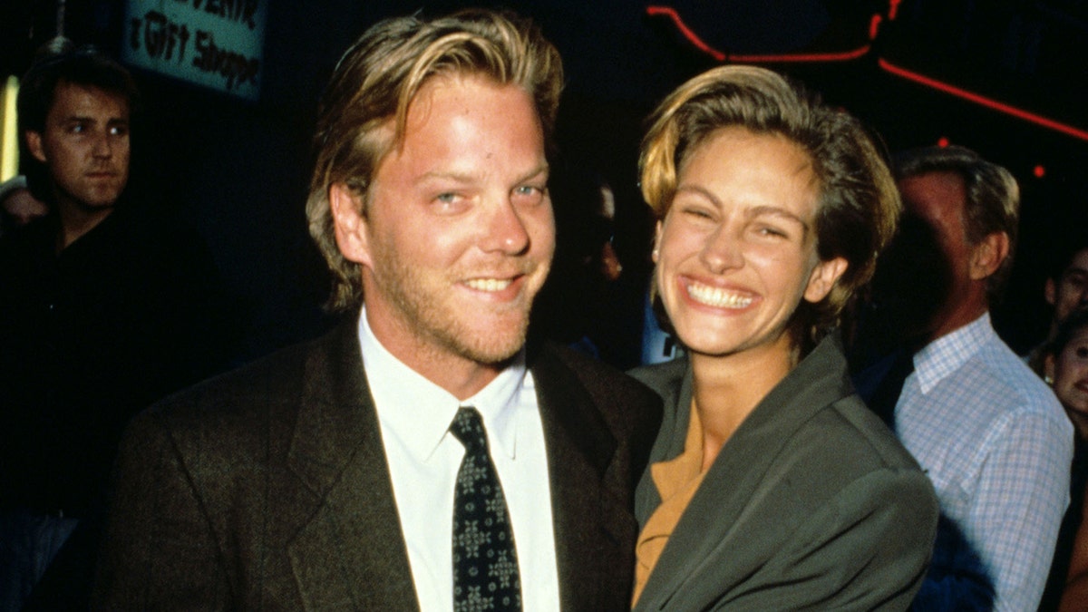 Kiefer Sutherland and Julia Roberts at the premiere of "Young Guns II."