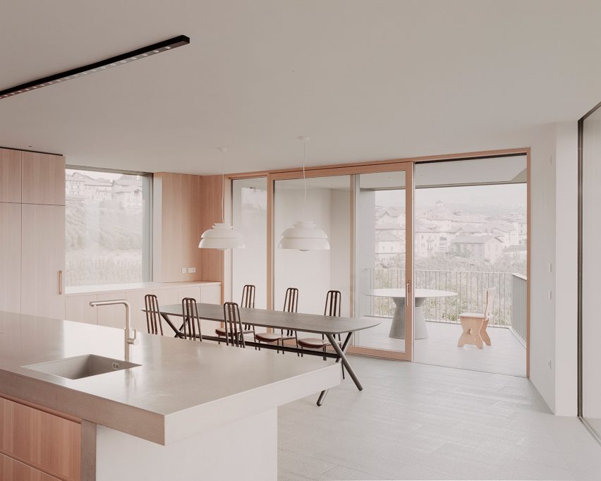 Dining room interior at dwelling by MoDusArchitects