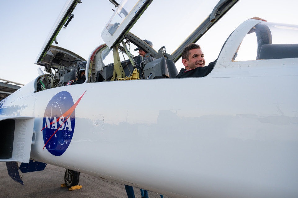 NASA Administrator Jared Isaacman in the cockpit of a fighter jet.