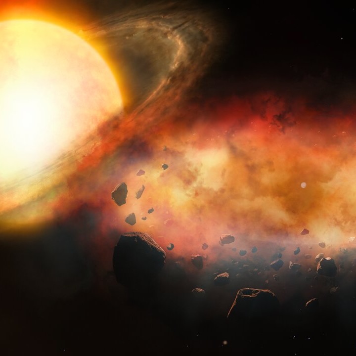 At left is a star with a debris disk and at center is more debris, a lot of rocks inside a dusty cloud.