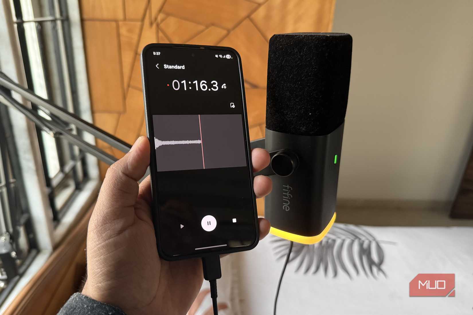 Phone connected to microphone using cable
