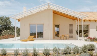 pitched metal roofs unify greek renovation project by local firm oblq