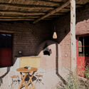 Quincho Bernarda Community Center / Taller MACAA (Misión de Arquitectura, Construcción y Arte en los Andes) - Interior Photography, Brick, Chair