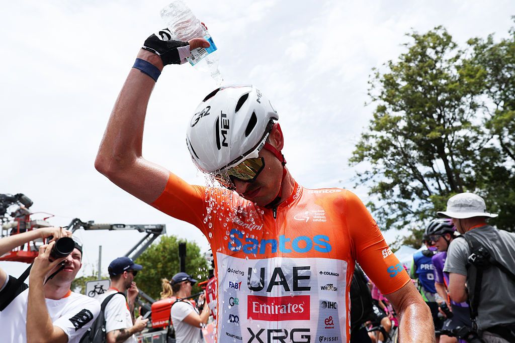 WILLUNGA, AUSTRALIA - JANUARY 24: Orange Santos Leader&amp;apos;s Jersey, Jay Vine of Australia and UAE Team Emirates cools down after cross the finish line in the 26th Santos Tour Down Under 2026, Stage 4 a 130.8km stage from Brighton to Willunga / #UCIWT / on January 24, 2026 in Willunga, Australia. (Photo by Con Chronis/Getty Images)