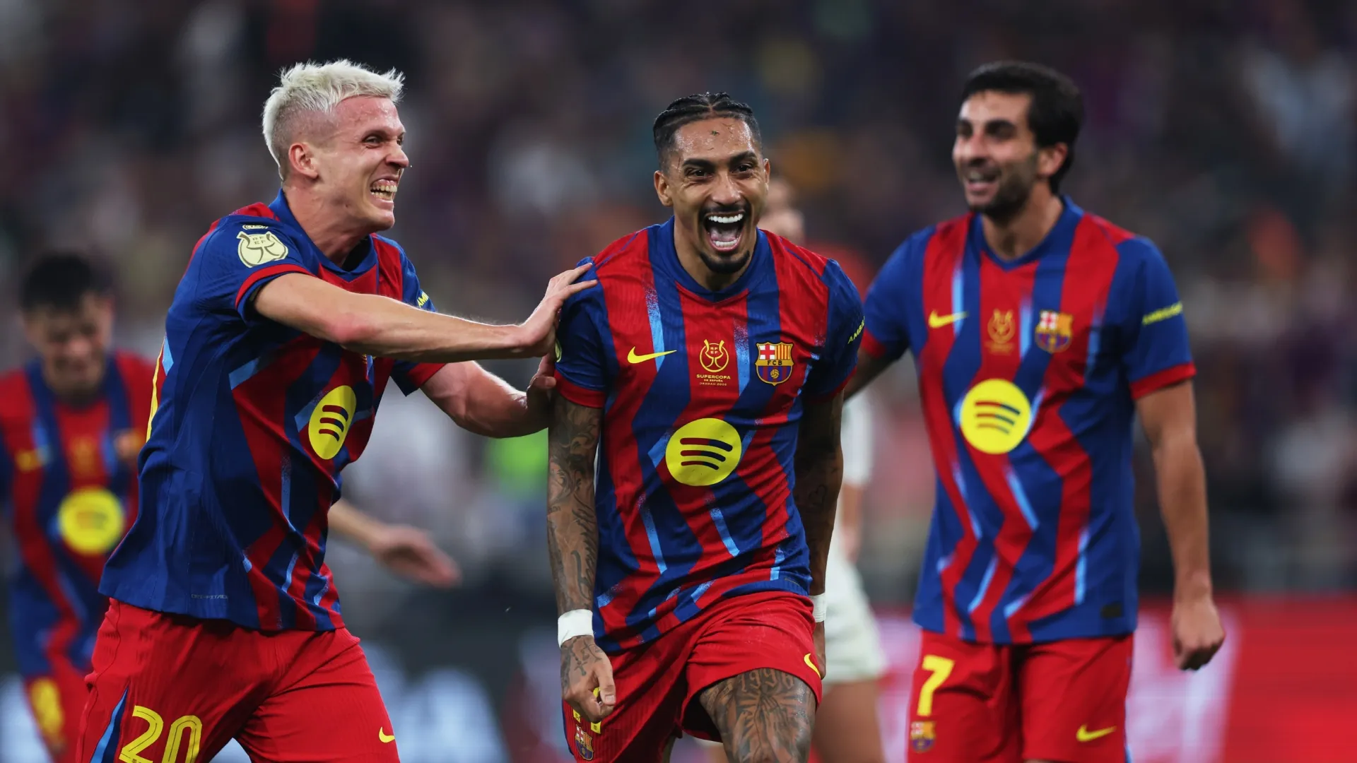 Raphinha of FC Barcelona celebrating scoring against Real Madrid.