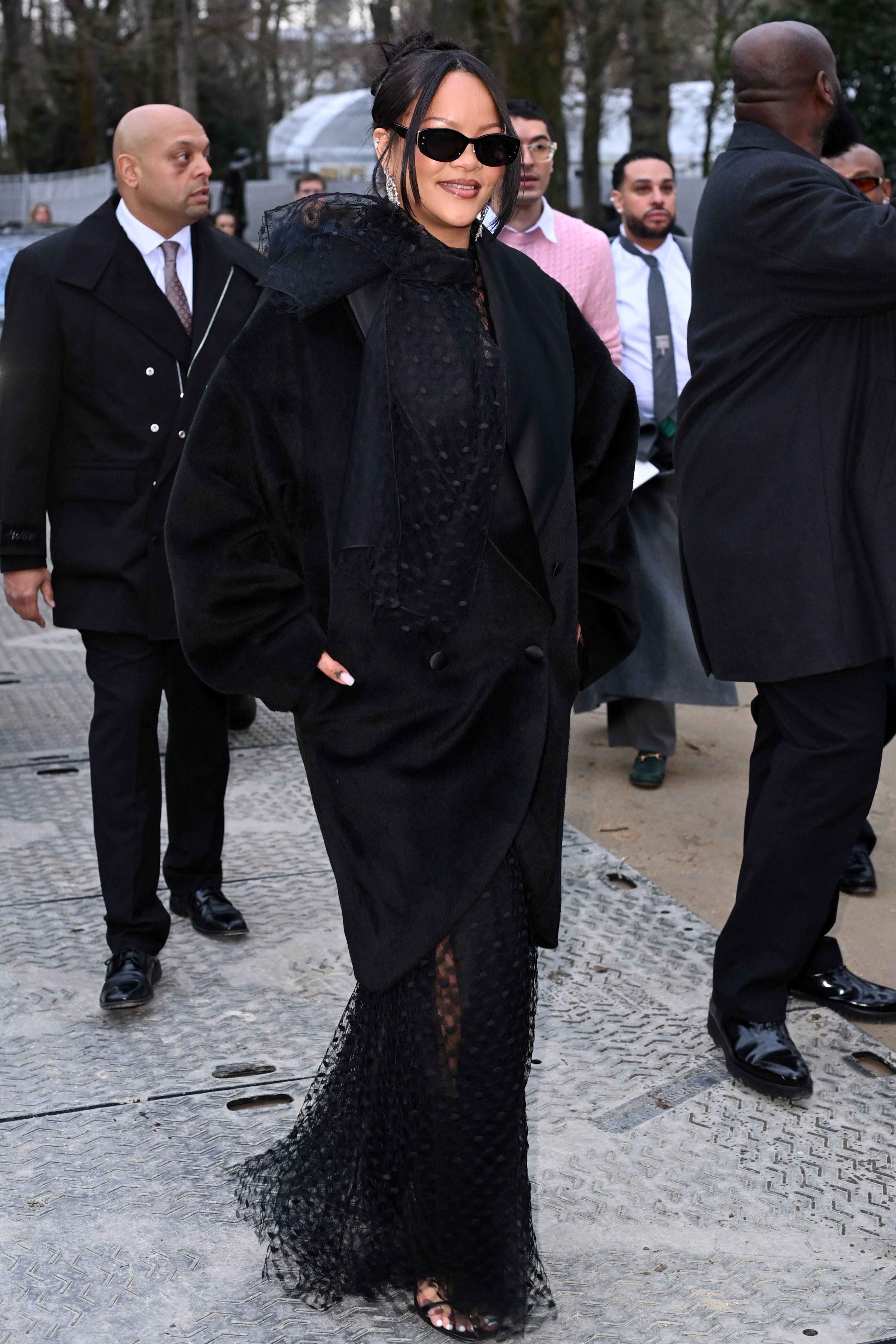 Rihanna attends the Christian Dior Haute Couture show during Paris Fashion Week.