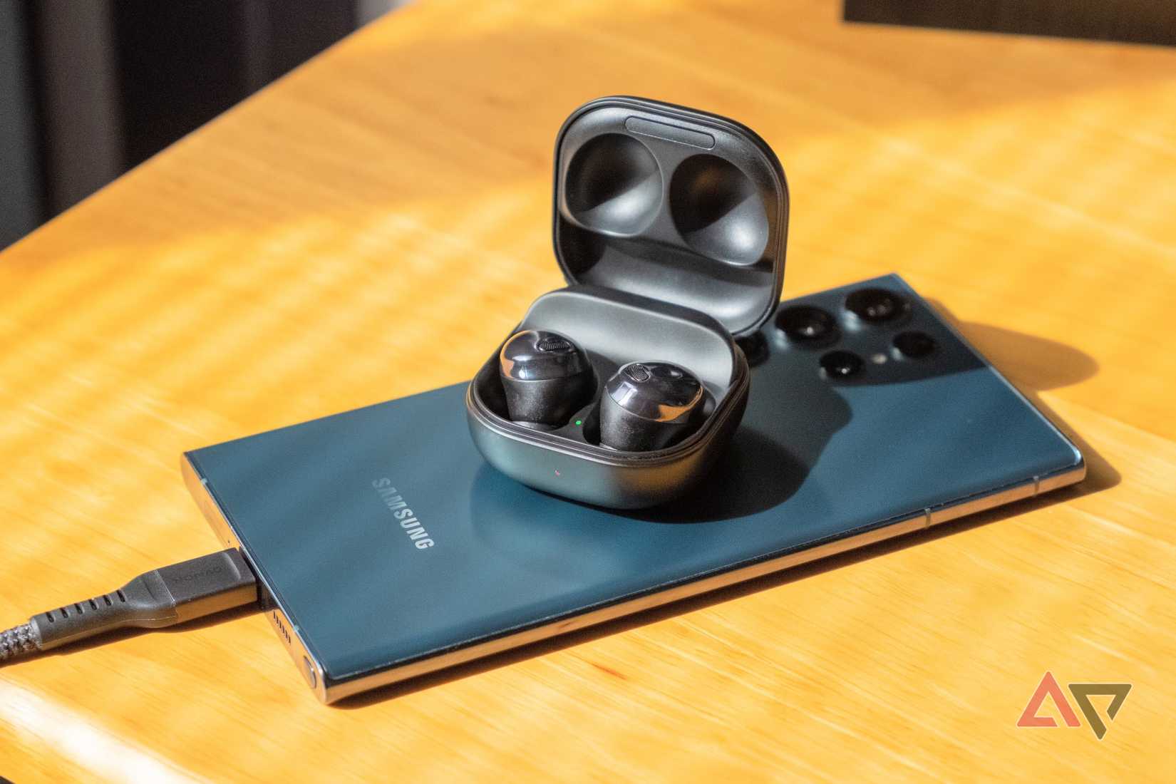 Samsung phone doing a reverse wireless charging for galaxy buds