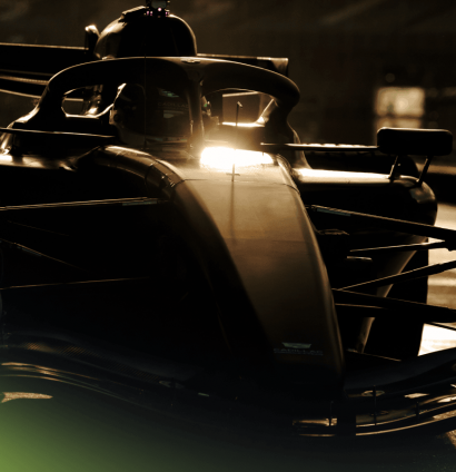 Golden light glints off the Cadillac F1 car as the sun sets at Silverstone