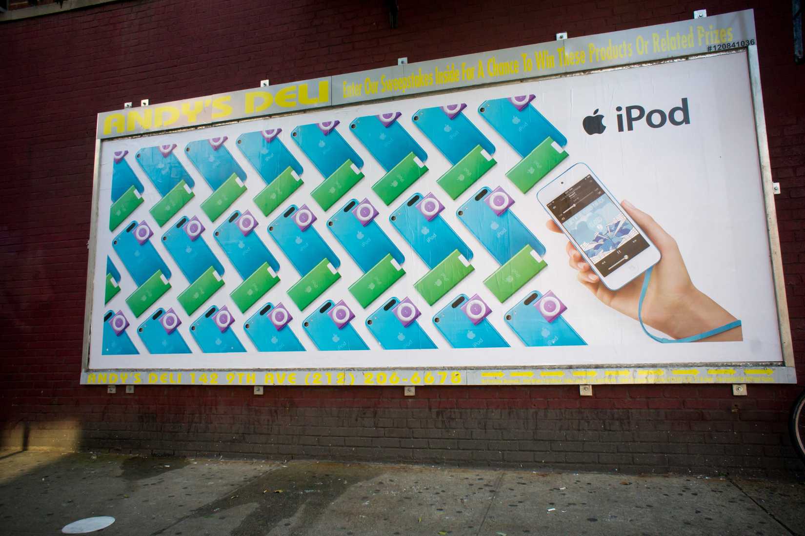 2012 Advertising for the Apple's line of iPods on a billboard in the Chelsea neighborhood of New York