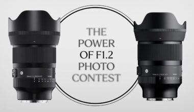 Two camera lenses face each other on either side of a circular graphic with the text "The Power of F1.2 Photo Contest" in the center. The background is light gray.