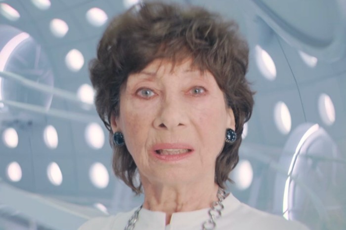 Carole Ann Ford as Susan in Doctor Who stood in white in the TARDIS
