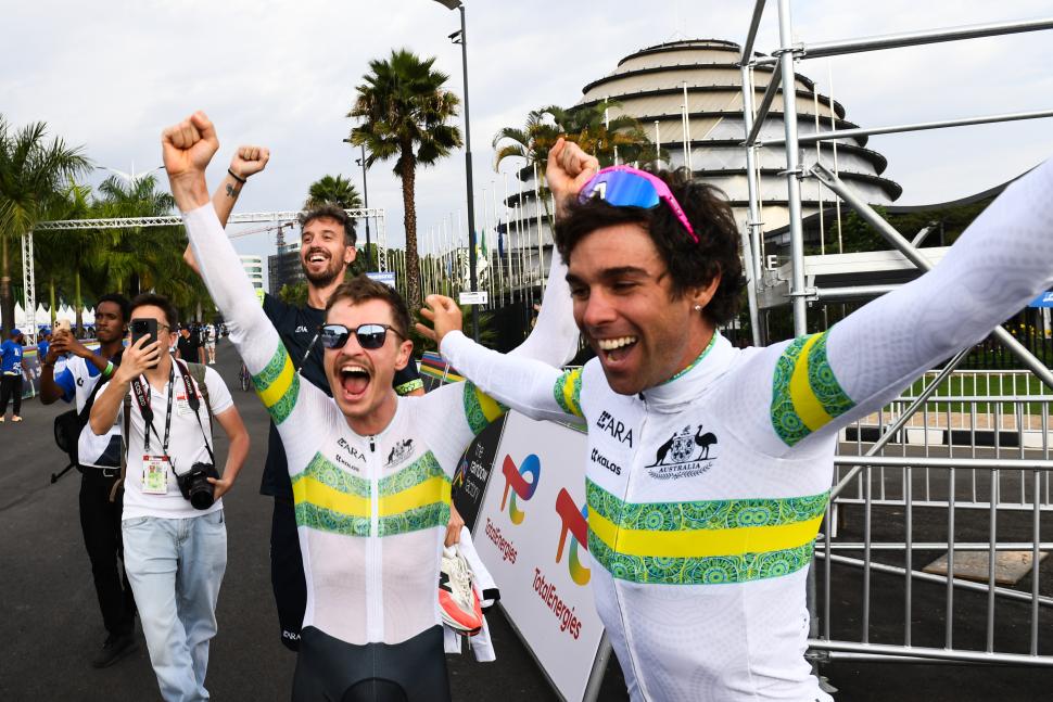 Michael Matthews and Jay Vine celebrate winning the mixed relay TTT for Australia, 2025 world championships, Kigali