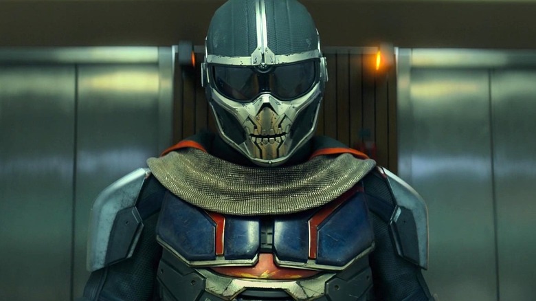 Taskmaster stands in front of elevator doors in 