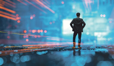 man standing with his hands on his hips