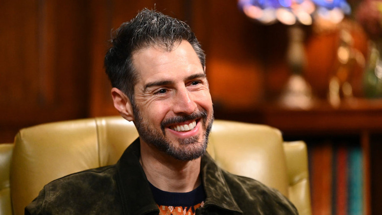 Rob Cesternino smiles during an interview on The Traitors Season 4