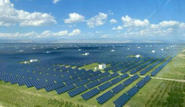 Solar panels covering an alpine desert on the Tibetan Plateau where vegetation and soil moisture are increasing beneath the array.