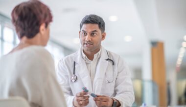 Doctor talking to patient.