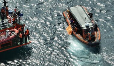 Indonesian rescuers find a second body as search for Spanish soccer coach and 2 children extended