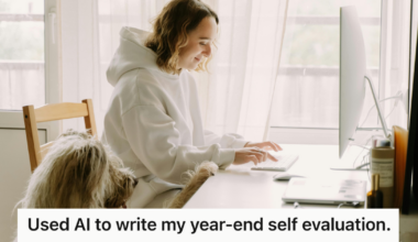 woman working from home with her dog next to her