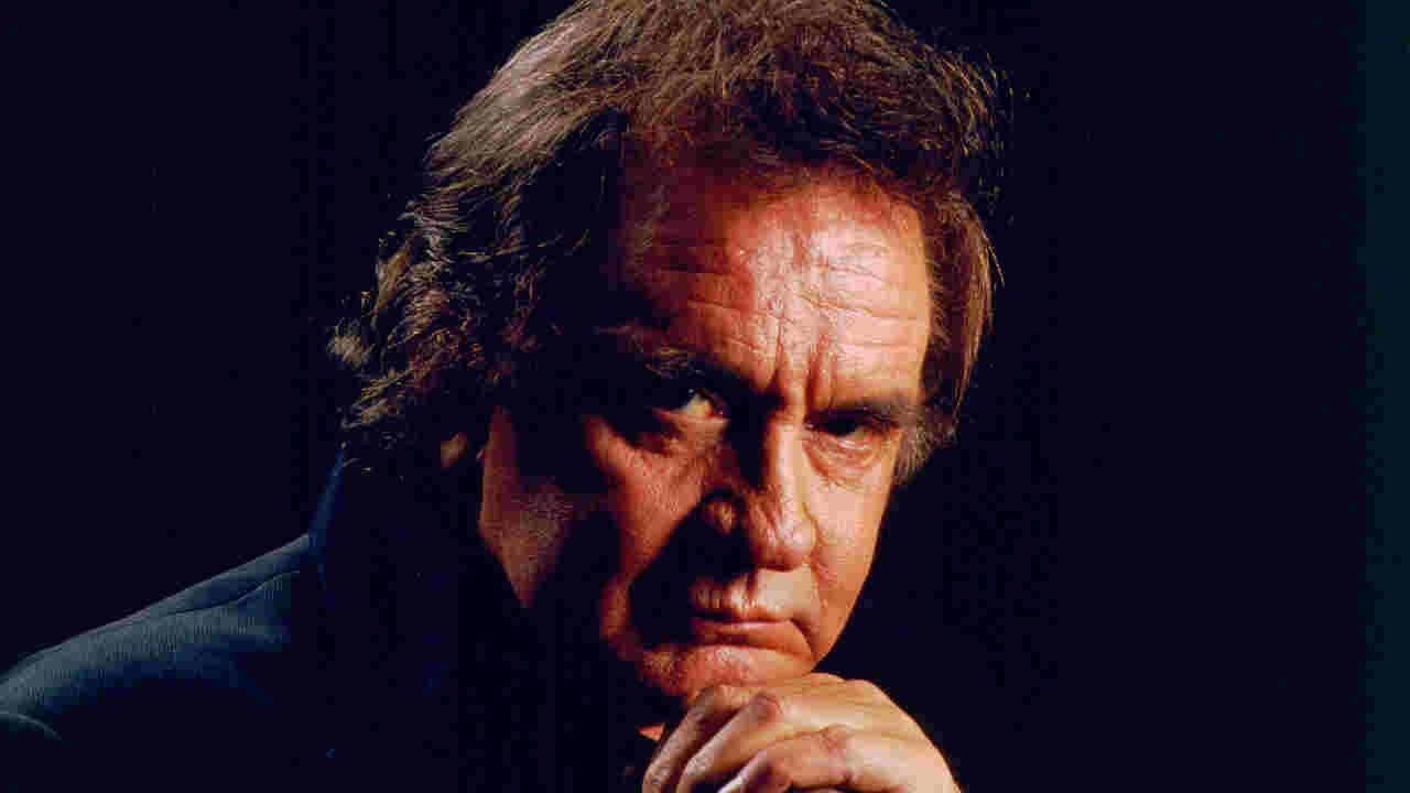 Johnny Cash posing for a photograph in 1994