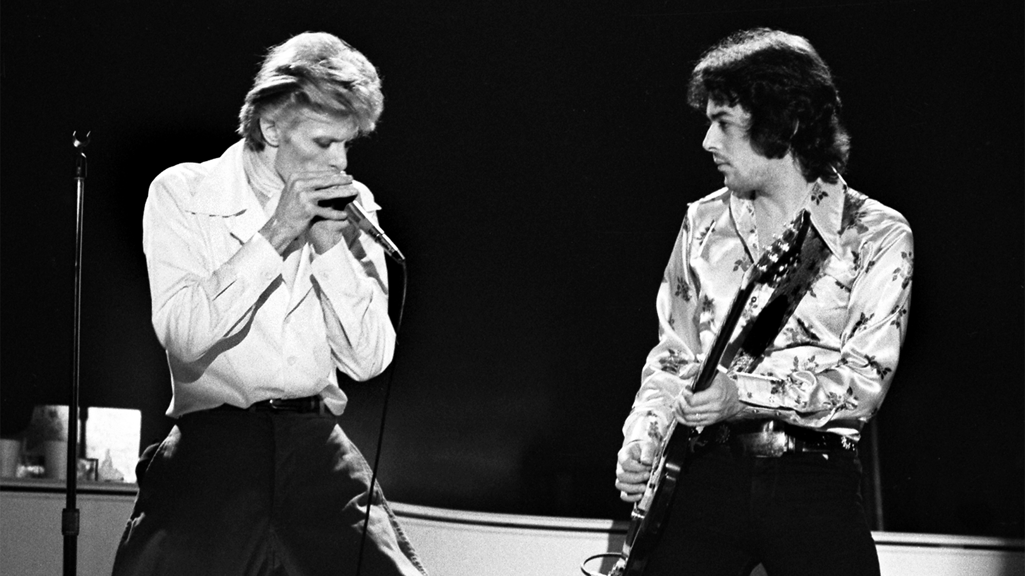 David Bowie and Earl Slick performing on David Bowies' Diamond Dogs Tour at the Boston Music Hall on November 15, 1974