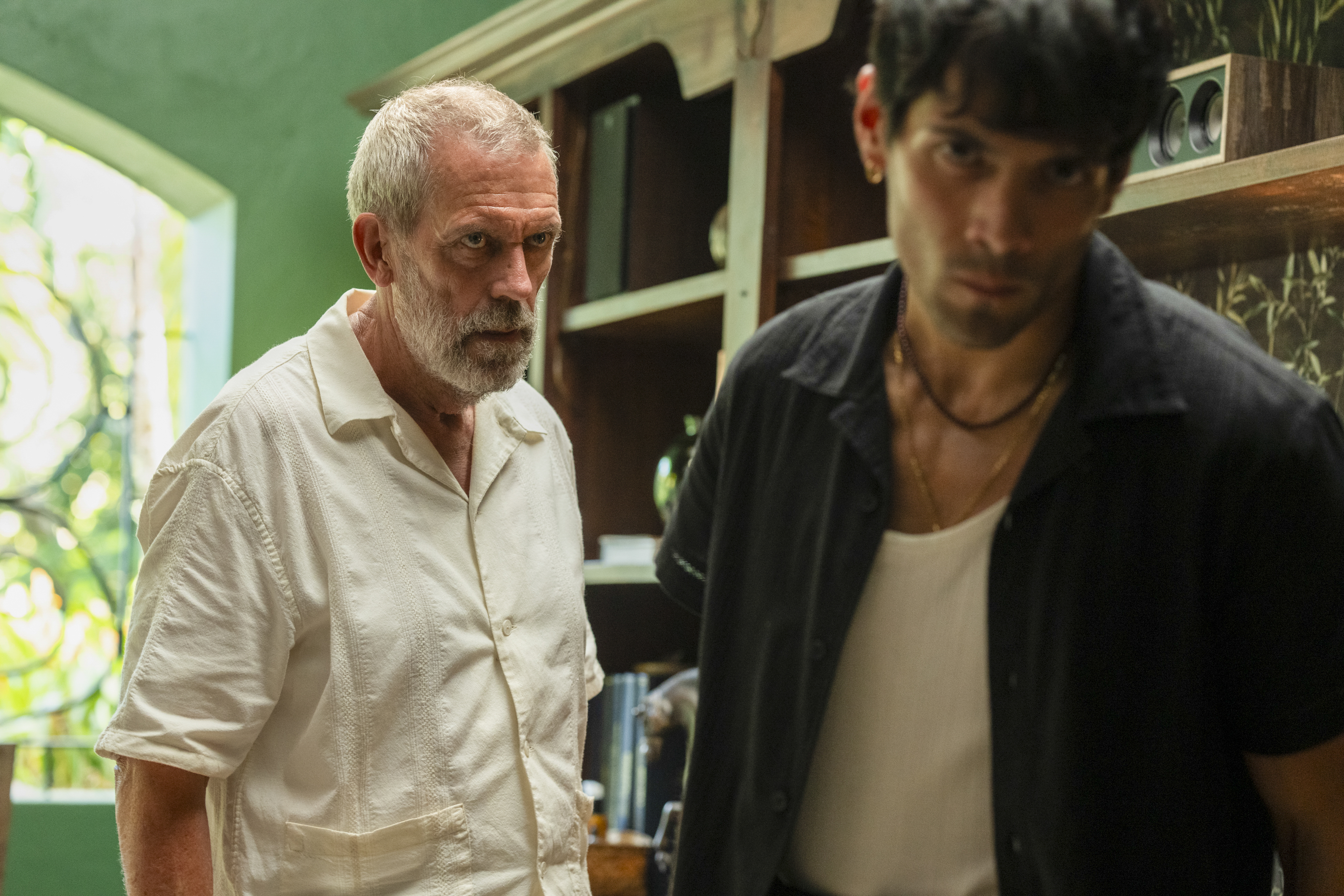 Roper (Hugh Laurie) and Teddy (Diego Calva) from The Night Manager S2.