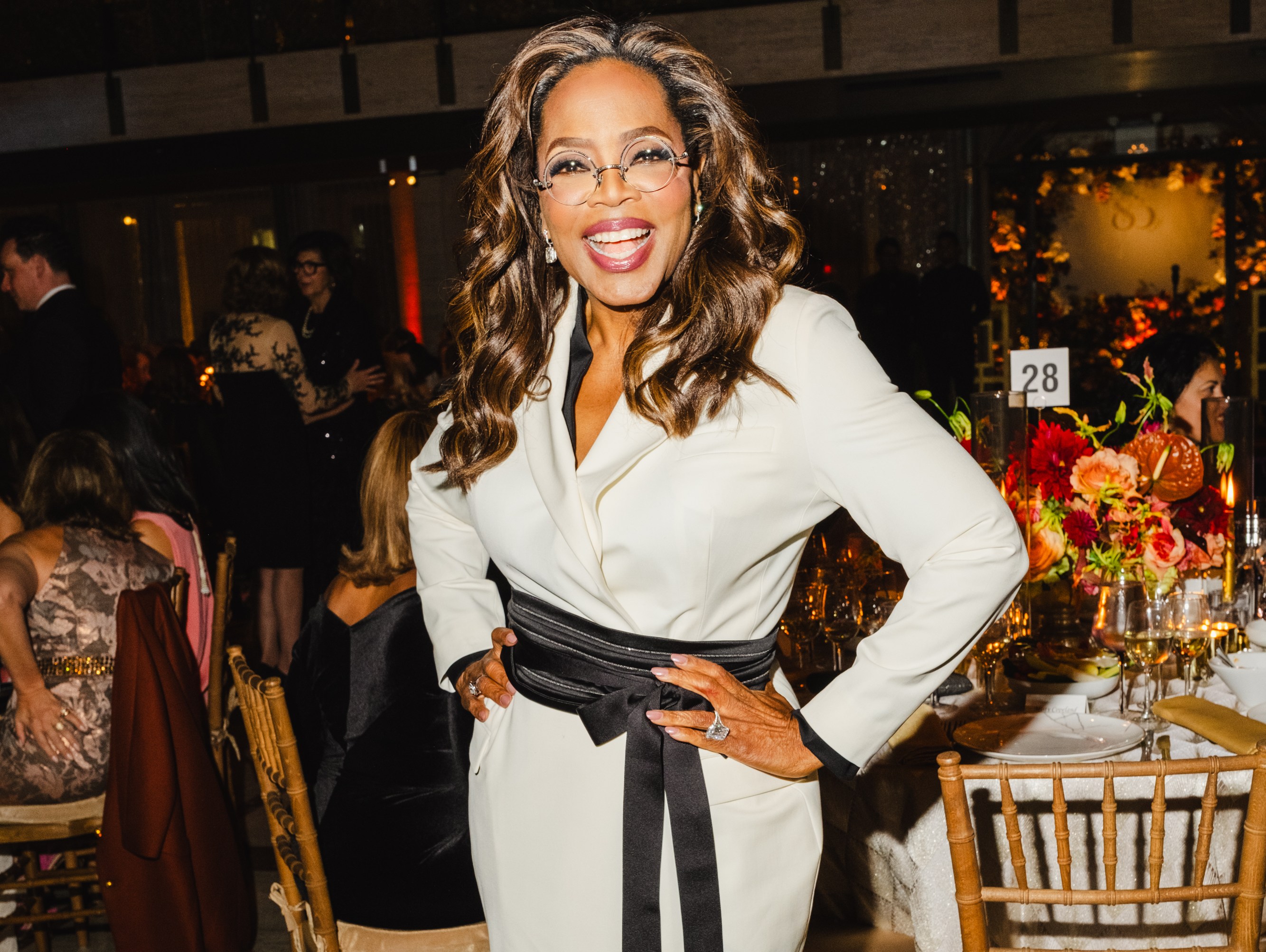 Oprah Winfrey in a cream long-sleeved dress with a black sash at the American Ballet Theatre Fall Gala.