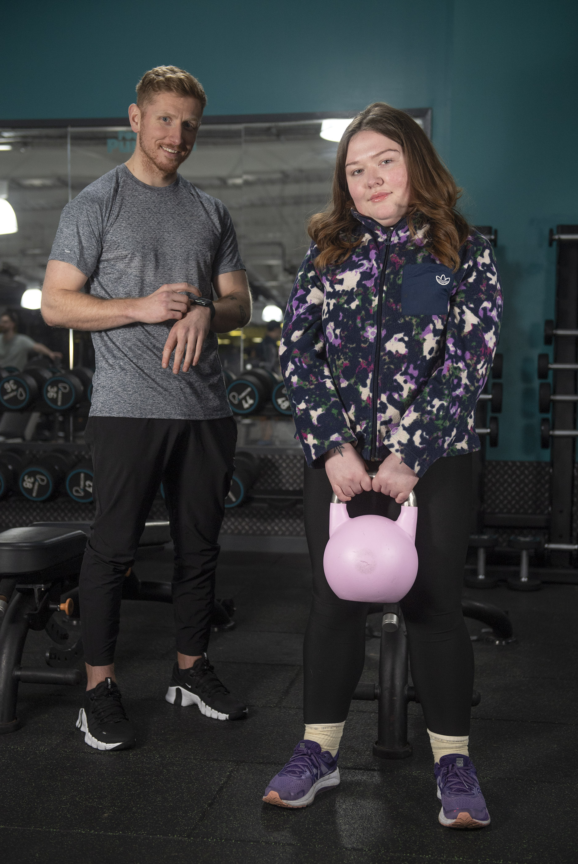 Personal trainer Matthew Solomon and client Nicola Tosh at Pure Gym in Glasgow.