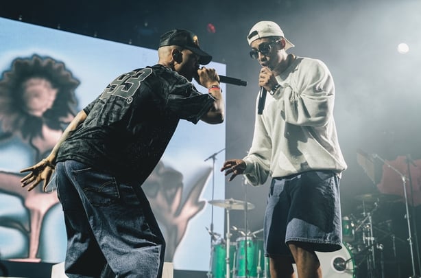 SHEFFIELD, ENGLAND - JULY 26: Harley Sylvester (L) and Jordan Stephens (R) of Rizzle Kicks perform onstage during Tramlines at Hillsborough Park on July 26, 2025 in Sheffield, England. (Photo by Luke Brennan/Getty Images)