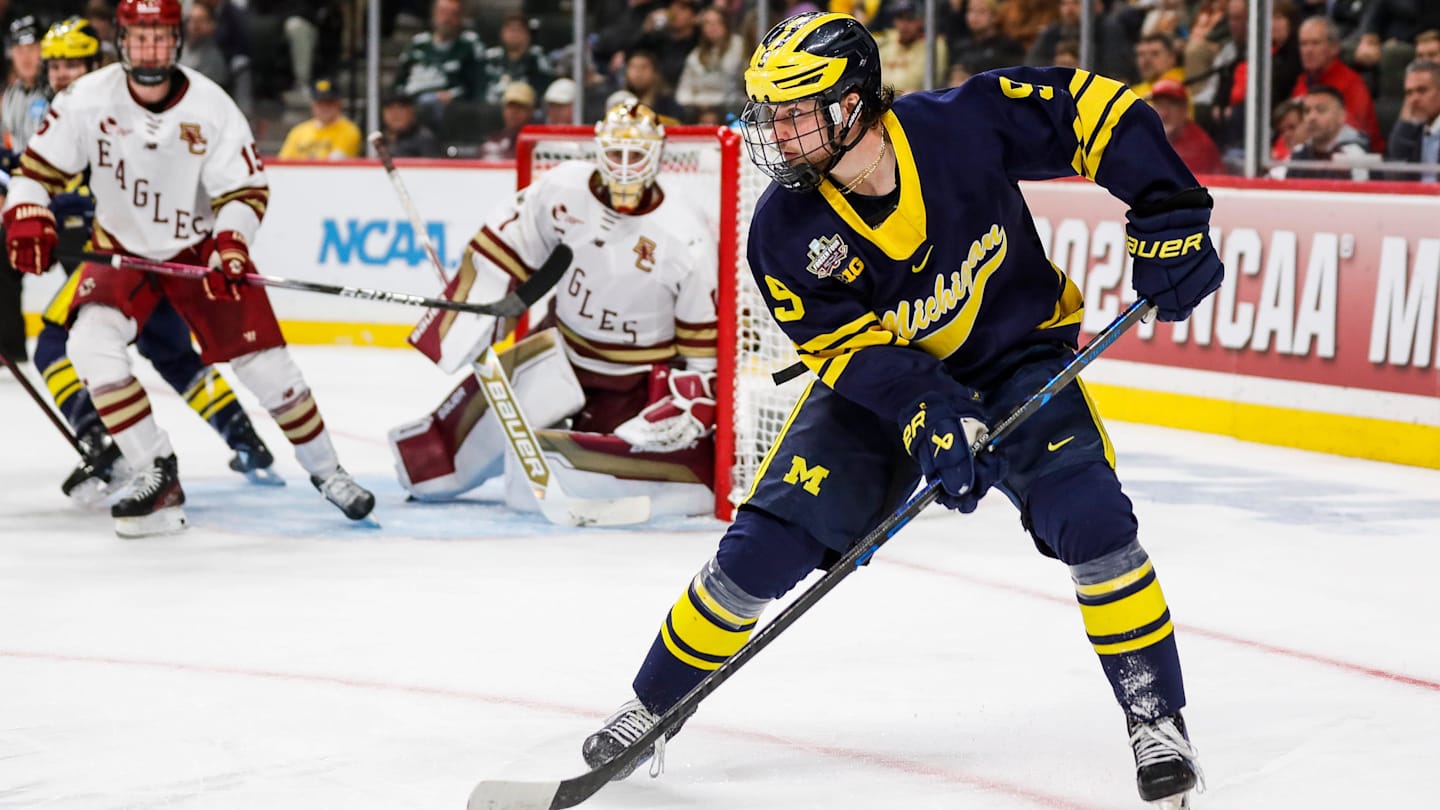 Michigan forward Nick Moldenhauer (9) looks to pass against Boston College during the third period of the Frozen Four semifinal game at Xcel Energy Center in St. Paul, Minn. on Thursday, April 11, 2024.