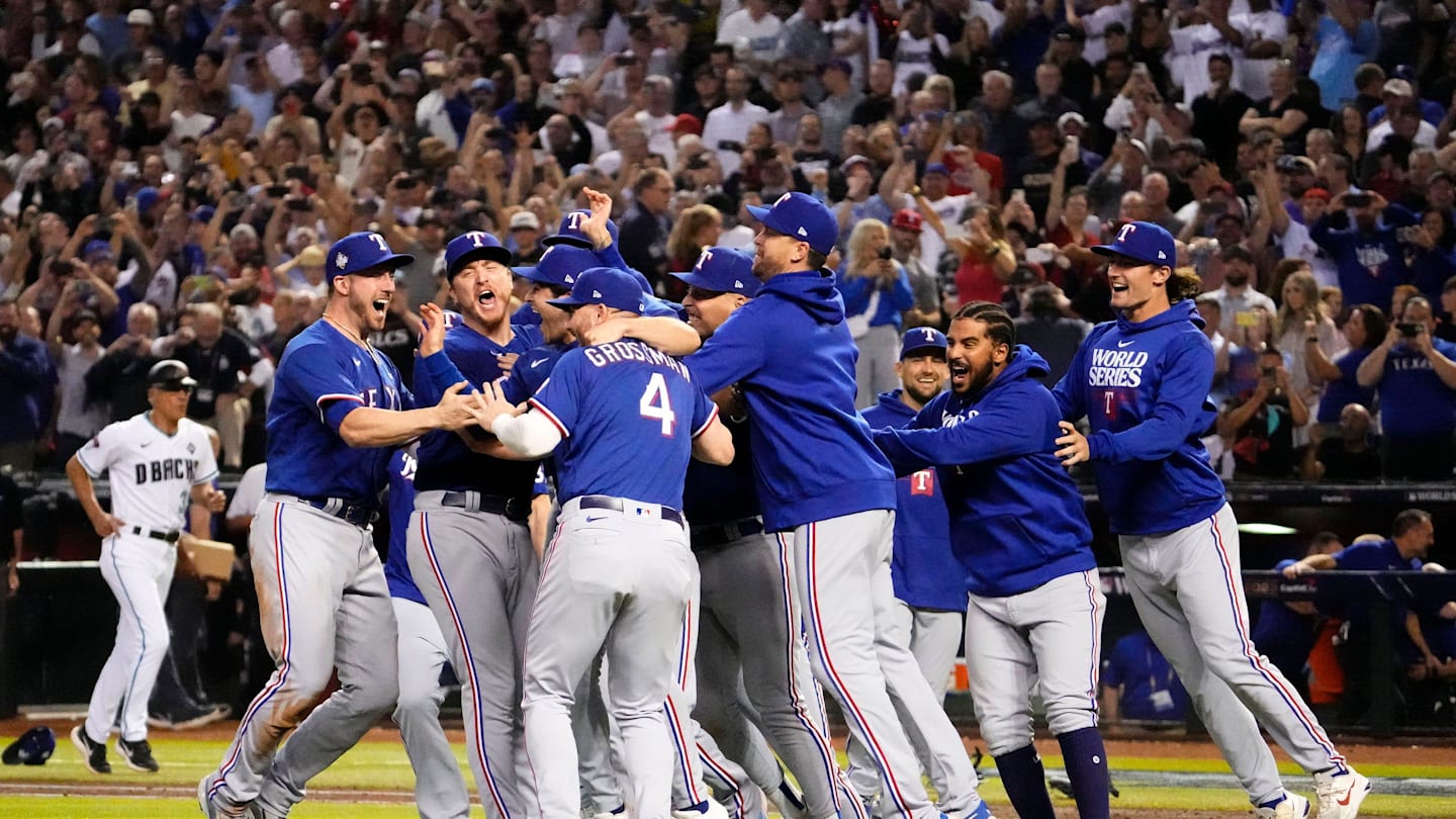 The Texas Rangers celebrate after defeating the Arizona Diamondbacks in Game 5 to become the 2023 World Series champions at Chase Field on Nov 1, 2023.