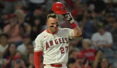 Sep 23, 2025; Anaheim, California, USA;  Los Angeles Angels right fielder Mike Trout (27) tips his cap to the crowd as they applaud the announcment of his 400th career home run during the first inning against the Kansas City Royals at Angel Stadium. Mandatory Credit: Jayne Kamin-Oncea-Imagn Images